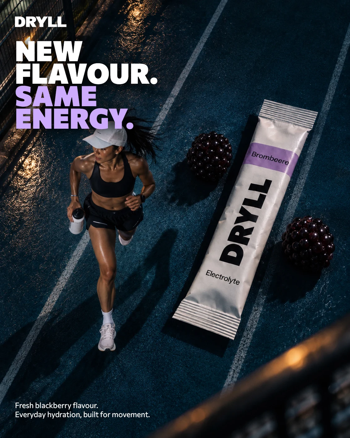 DRYLL poster with a runner, oversized electrolyte stick and blackberries on a wet track